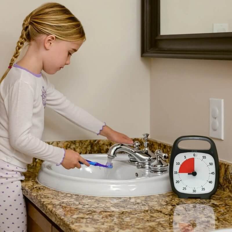 Time Timer girl brushing teeth